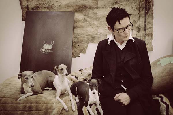 the atrist and her italian greyhounds