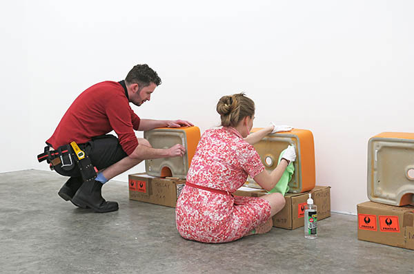 Emily & Hamish preparing the basins for the installation of Gentle on Hands